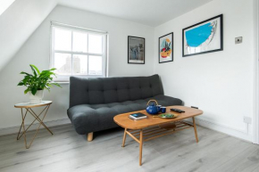 Newly Renovated Central One-Bedroom, 99 Steps to the Sea
